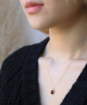 Garnet Oval Necklace 14k gold NYC fine jewelry brooklyn NY New York jeweler sustainable ethical greenpoint engagement