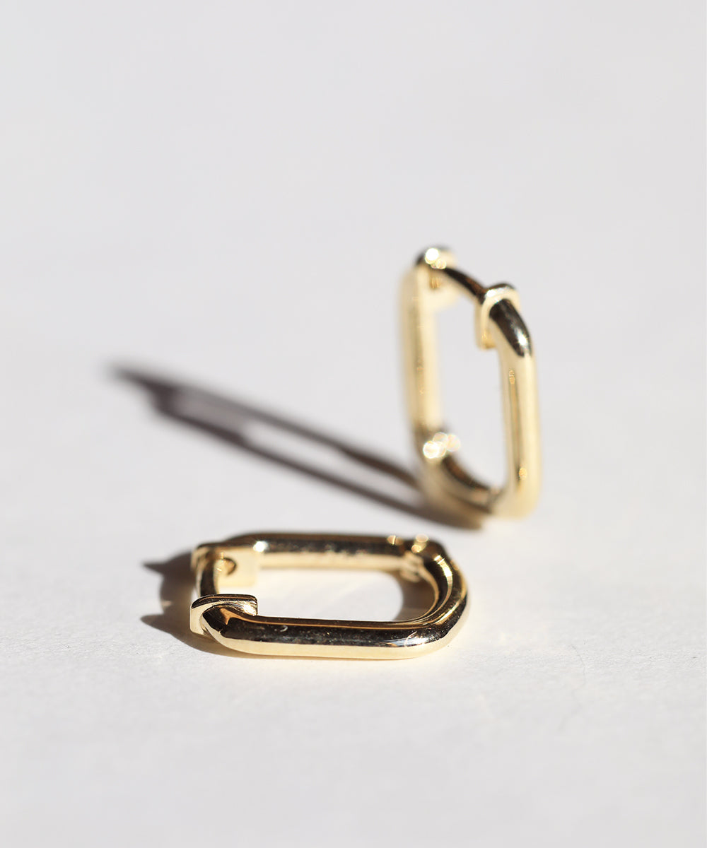 14k yellow gold huggie hoop earring NYC fine jewelry brooklyn NY New York jeweler sustainable ethical greenpoint engagement
