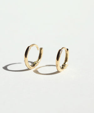 mini hinged huggies gold earrings Brooklyn New York 