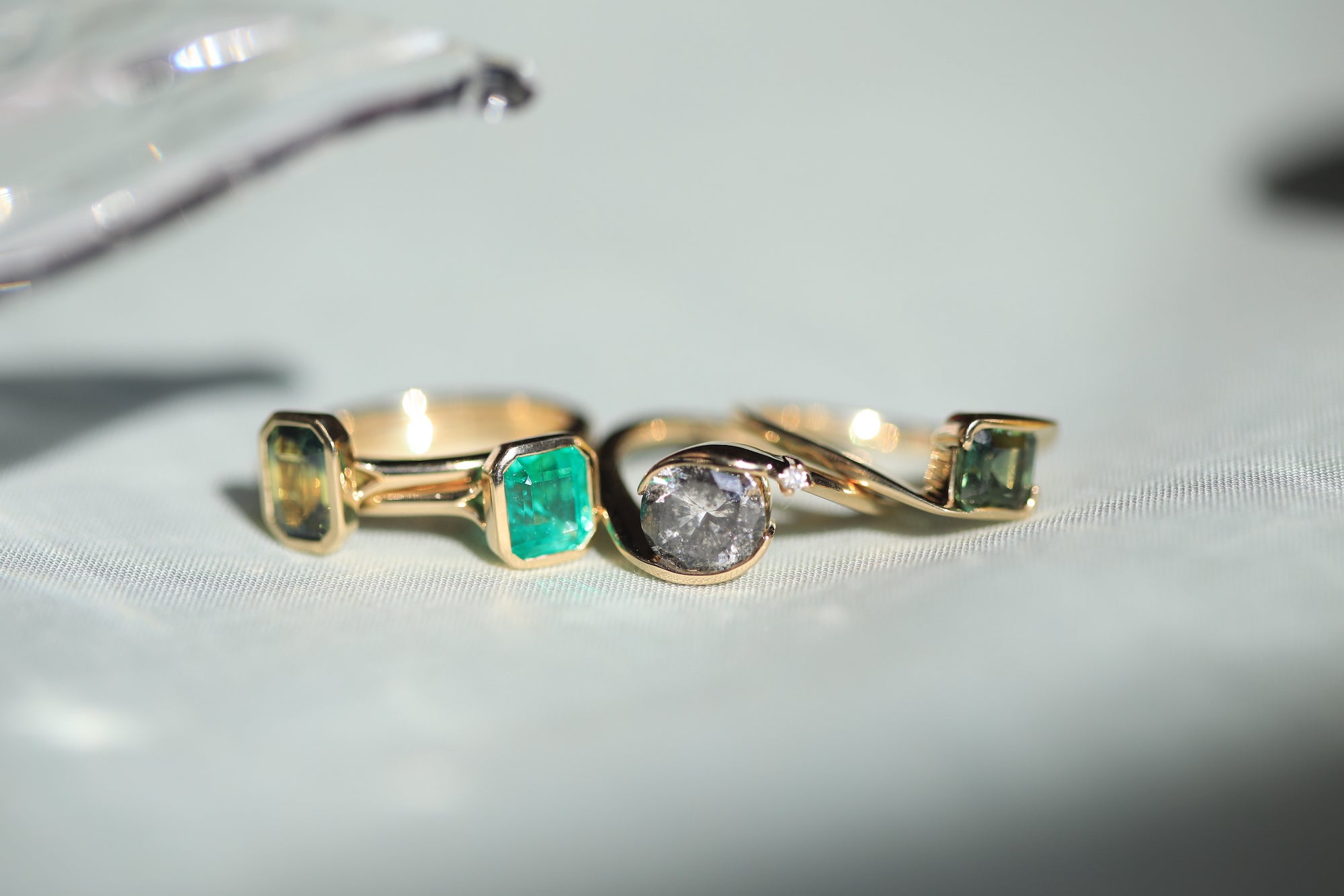 emerald sapphire and salt & pepper diamond engagement rings greenpoint brooklyn new york