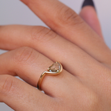 Crest ring with Cognac Trillion diamond