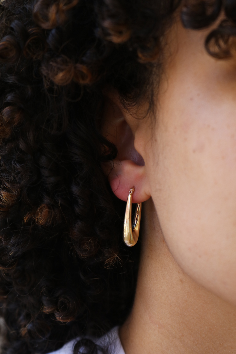 Elongated oval hoops 14k yellow gold Brooklyn New York 11222 