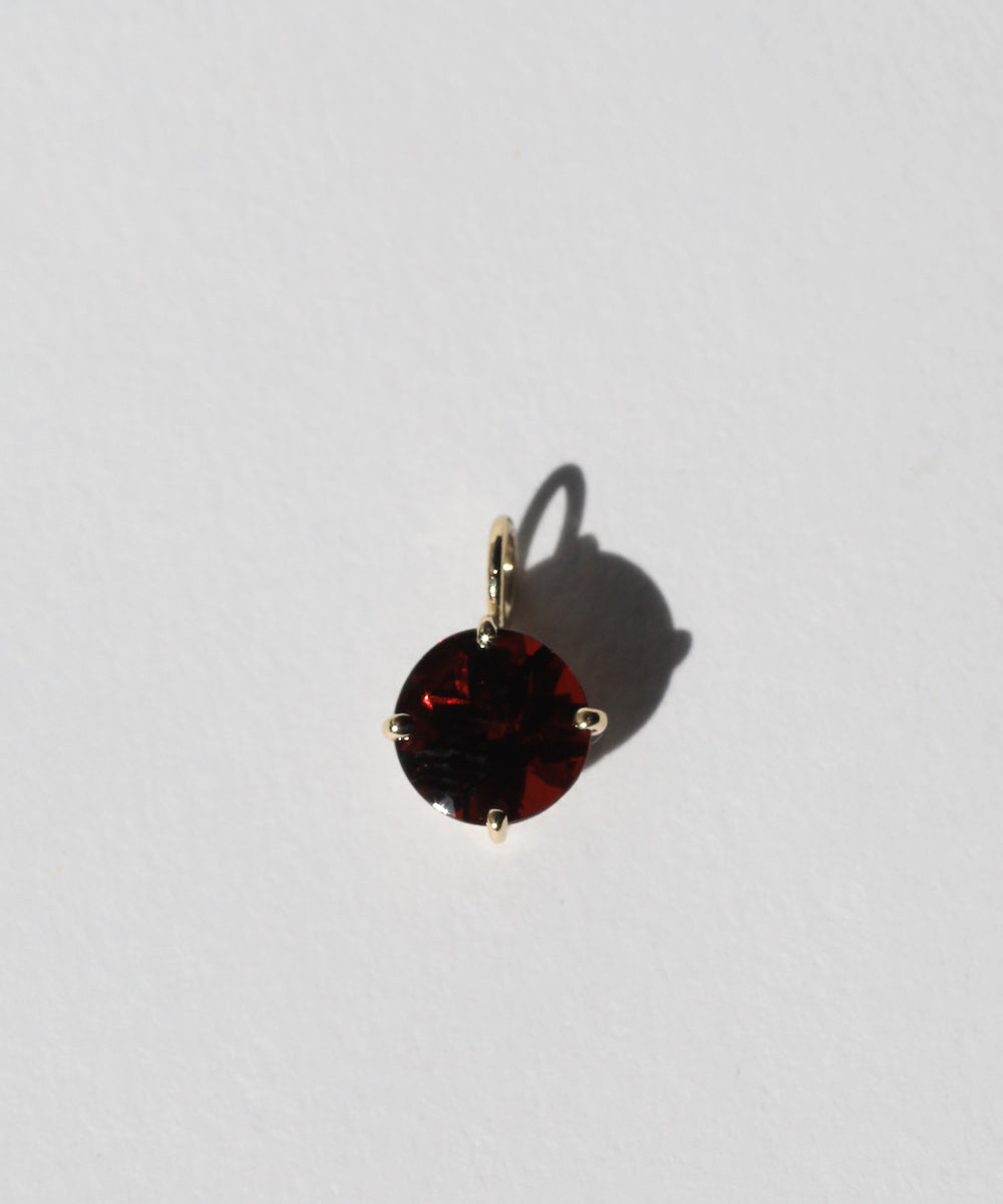 round garnet pendent prongs Brooklyn New York 