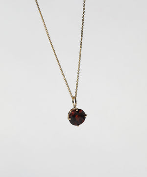 round garnet pendent prongs Brooklyn New York 