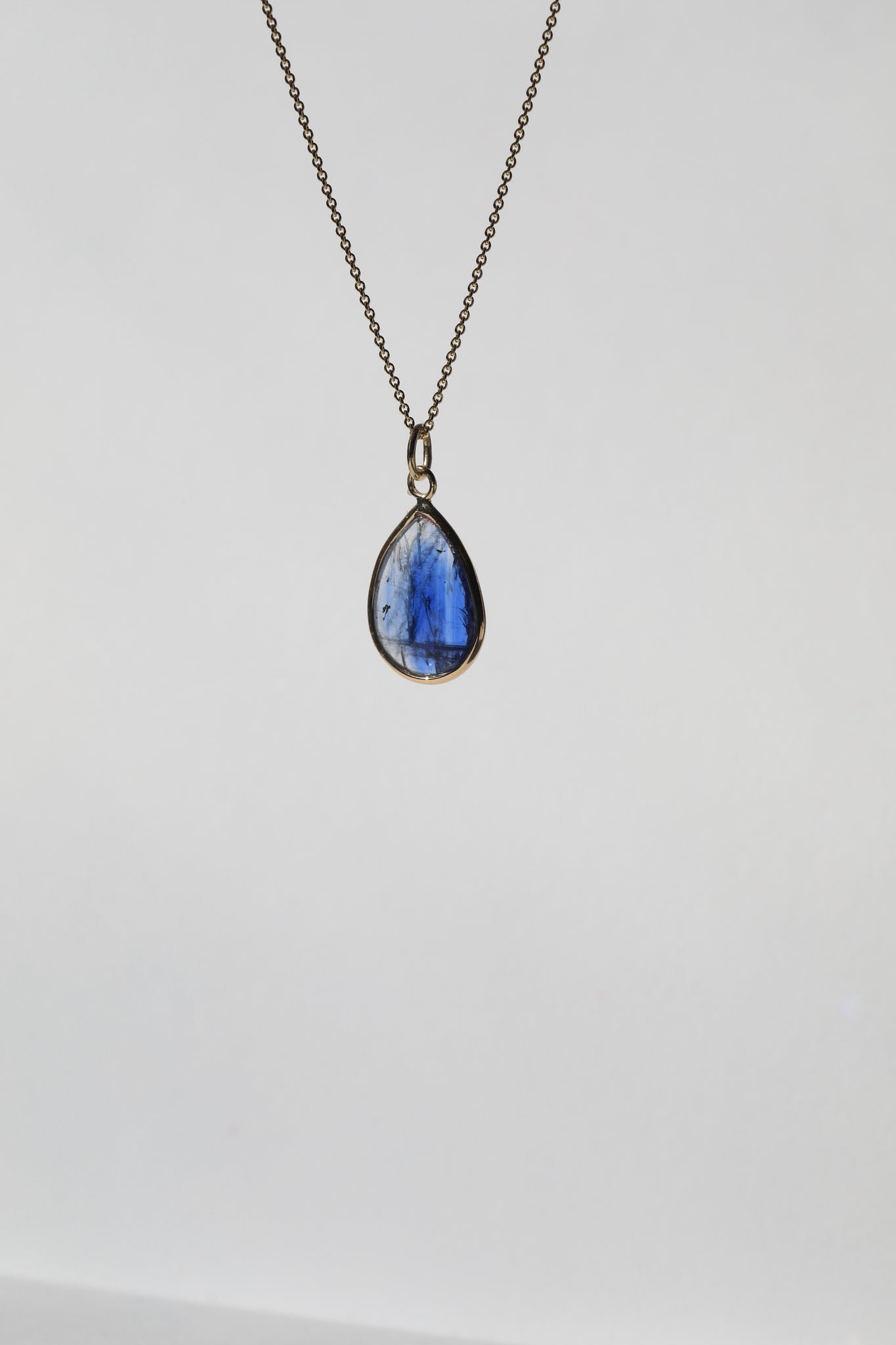 blue sapphire pear pendant Brooklyn New York 