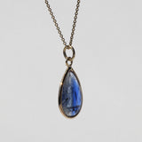 blue sapphire pear pendant Brooklyn New York 