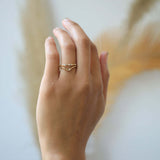 assorted v shaped bands 14k yellow gold diamonds rubies handcrafted macha studio brooklyn new york