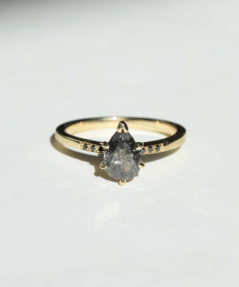Salt and Pepper Pear shaped Diamond with Black Diamonds set in a prong setting in 14k Yellow Gold made in Greenpoint Brooklyn New York City