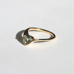 A pale blue Montana sapphire VS white diamond accent 14k yellow gold band Greenpoint Brooklyn New York City 11222