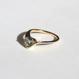 A pale blue Montana sapphire VS white diamond accent 14k yellow gold band Greenpoint Brooklyn New York City 11222