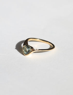 A pale blue Montana sapphire VS white diamond accent 14k yellow gold band Greenpoint Brooklyn New York City 11222