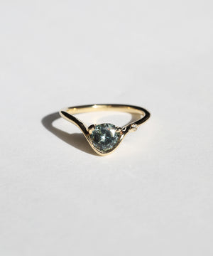 A pale blue Montana sapphire VS white diamond accent 14k yellow gold band Greenpoint Brooklyn New York City 11222