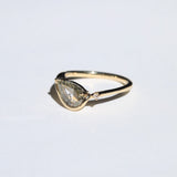 Crest ring with peppery white diamond