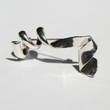 sculptural brooch or lapel pin for weddings, crafted in sterling silver by Macha Studio, Greenpoint, Brooklyn NYC