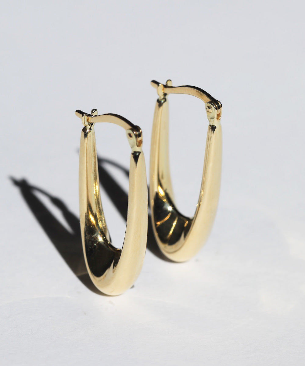 Elongated oval hoops 14k yellow gold Brooklyn New York 11222 