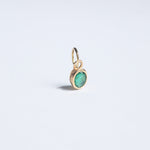 Oval cut emerald pendant, can be easily affixed to most chains. 