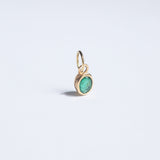 Oval cut emerald pendant, can be easily affixed to most chains. 