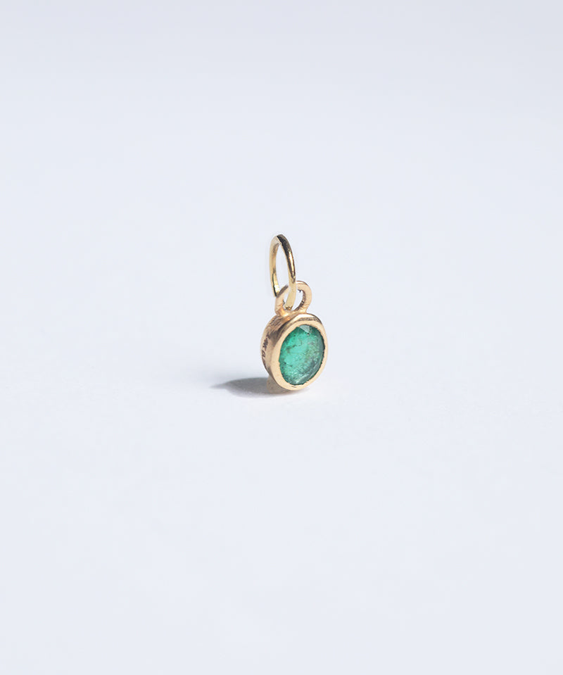 Oval cut emerald pendant, can be easily affixed to most chains. 