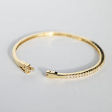 Diamond studded oval bangle