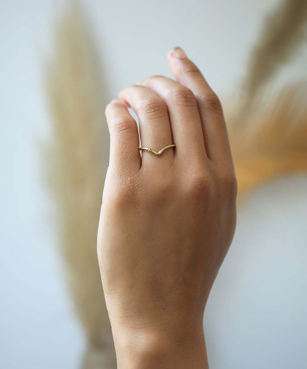 assorted v shaped bands 14k yellow gold diamonds rubies handcrafted macha studio brooklyn new york