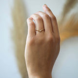 assorted v shaped bands 14k yellow gold diamonds rubies handcrafted macha studio brooklyn new york
