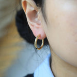 14k gold Medium hoops earrings NYC fine jewelry brooklyn NY New York jeweler sustainable ethical greenpoint engagement