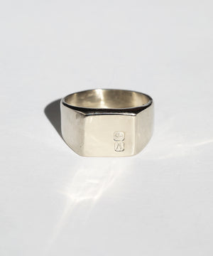 large 14k white gold signet ring featuring British hallmarks and date letter 'w' handcrafted macha studio brooklyn new york