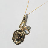 Swivel charm connector
