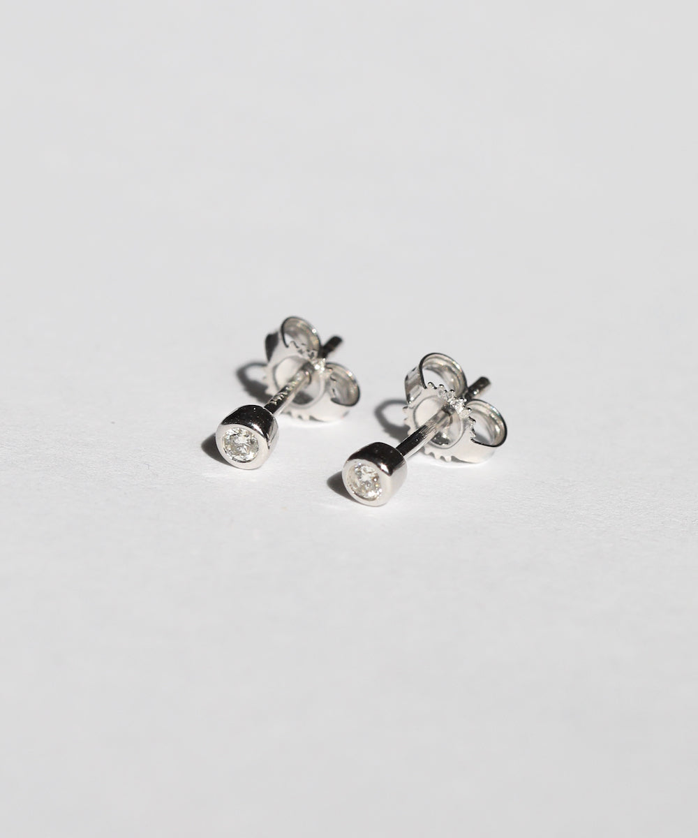 round bezel white diamond earring 14k yellow gold Brooklyn New York 