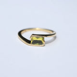 Orbit Ring with Chartreuse Emerald Cut Sapphire