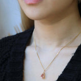 pendent charm 14k yellow gold sunstone NYC fine jewelry brooklyn NY New York jeweler sustainable ethical greenpoint engagement