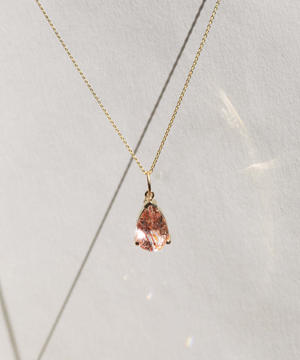 pendent charm 14k yellow gold sunstone NYC fine jewelry brooklyn NY New York jeweler sustainable ethical greenpoint engagement