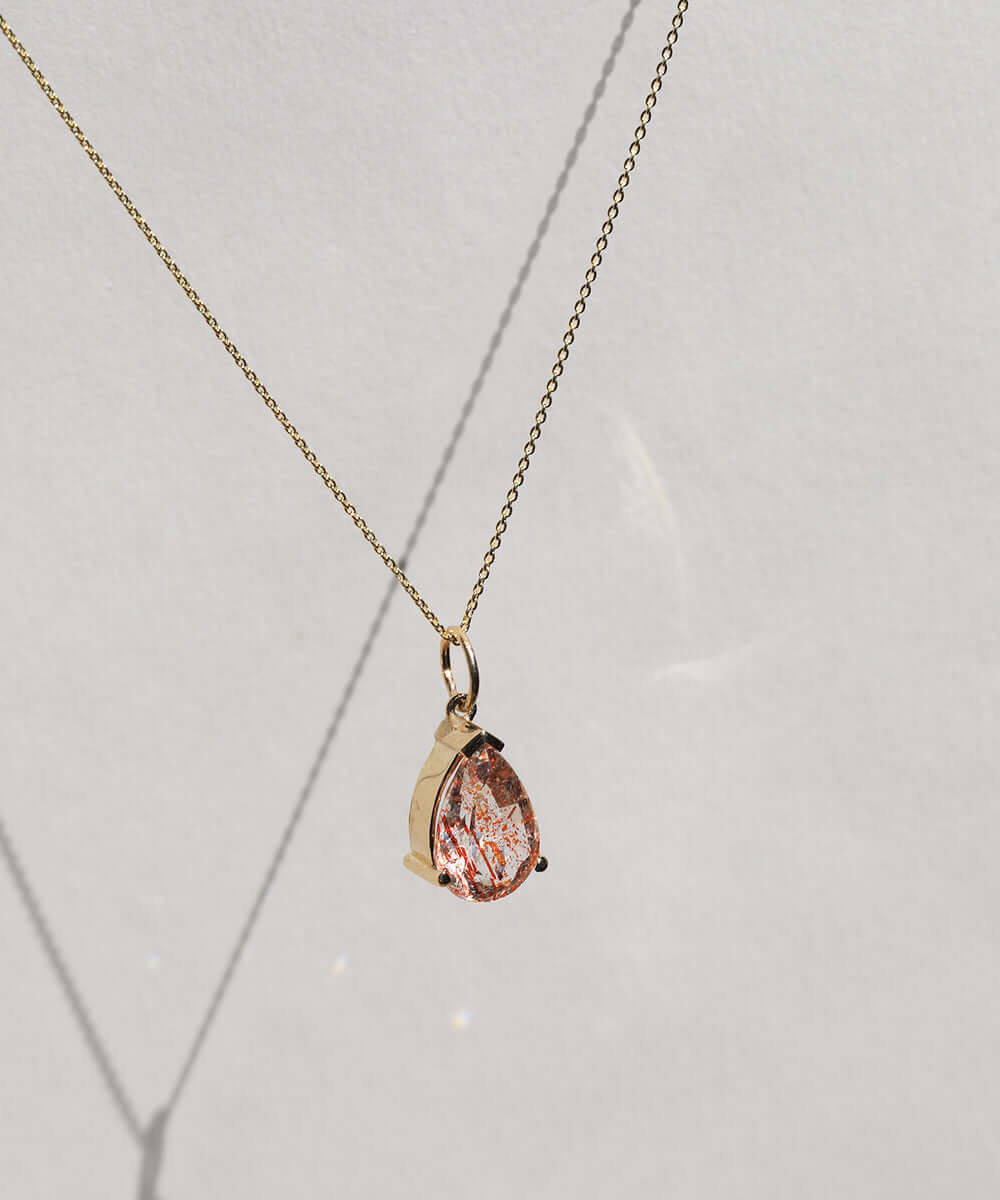 pendent charm 14k yellow gold sunstone NYC fine jewelry brooklyn NY New York jeweler sustainable ethical greenpoint engagement