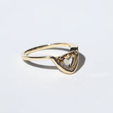 Crest ring with Cognac Trillion diamond