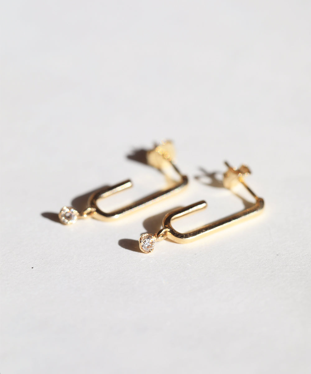 elongated hoop drop earring stud earrings diamond huggie 14k yellow gold NYC Brooklyn necklace NYC fine jewelry brooklyn NY New York jeweler sustainable ethical greenpoint engagement 