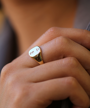 small 14k yellow gold signet ring with rounded square face featuring British hallmarks and date letter 'w' handcrafted macha studio brooklyn new york