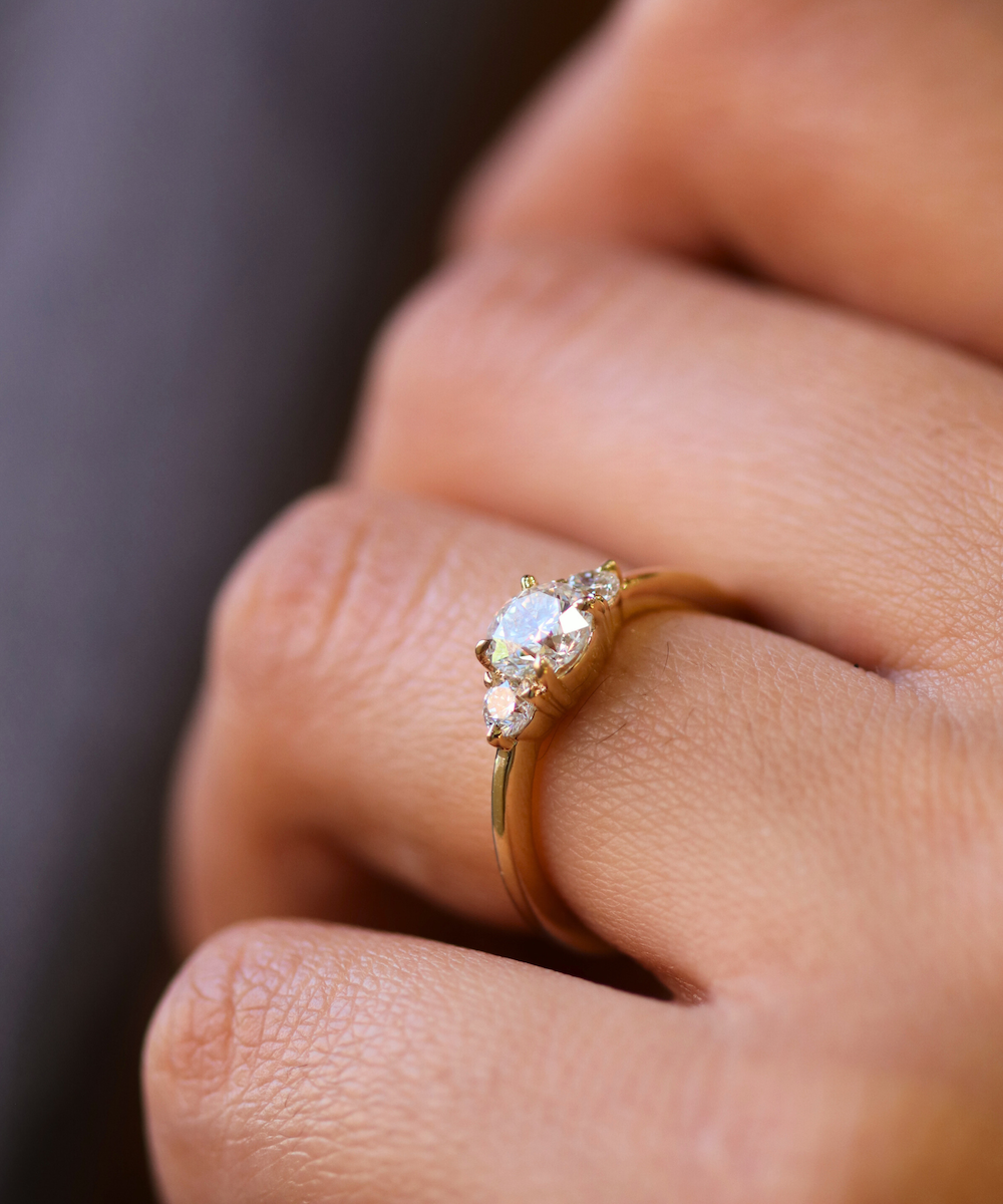 White diamond three stone engagement ring in 14k gold handcrafted macha studio brooklyn new york