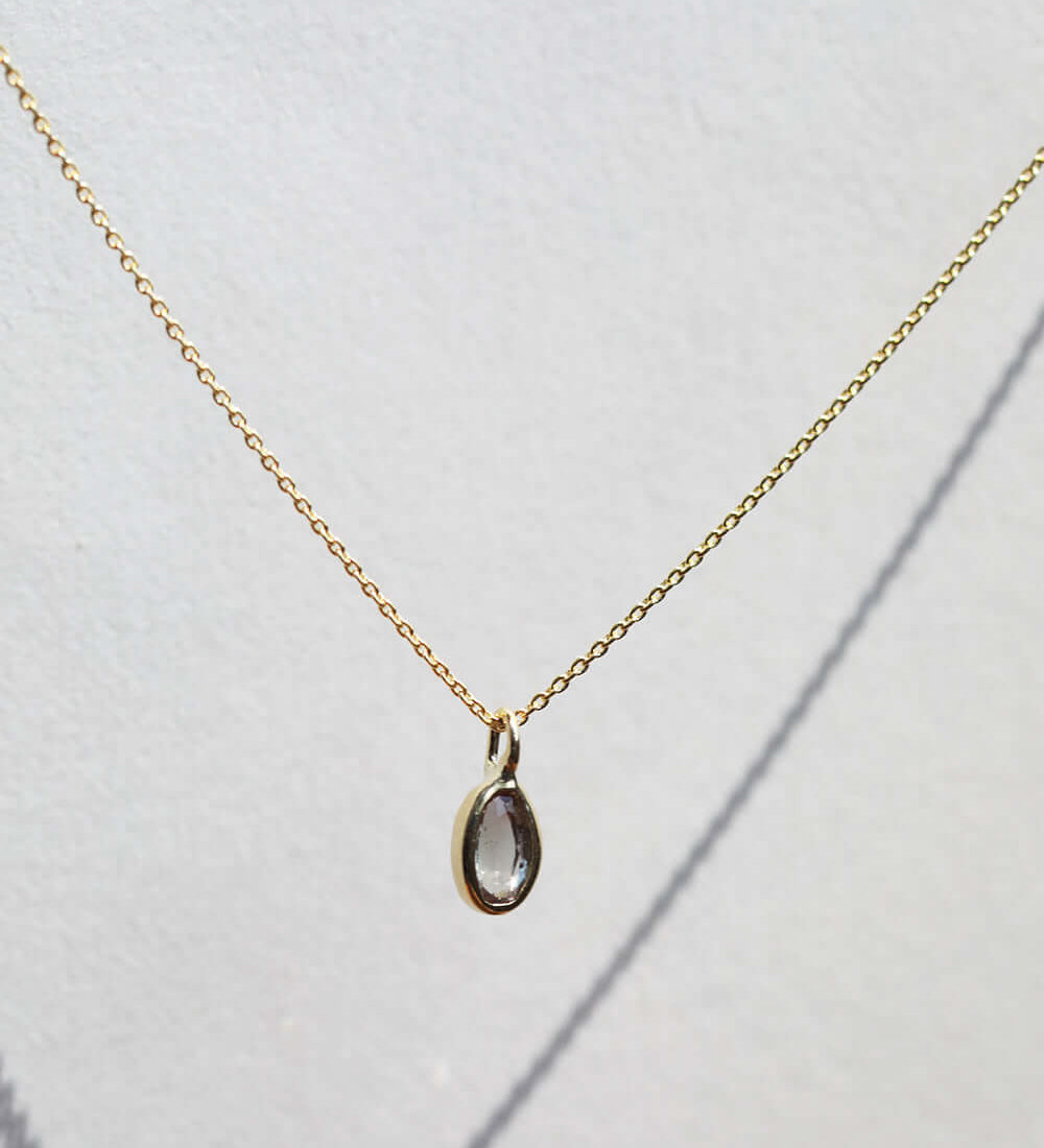 sunstone gem gold necklace NYC fine jewelry brooklyn NY New York jeweler sustainable ethical greenpoint engagement