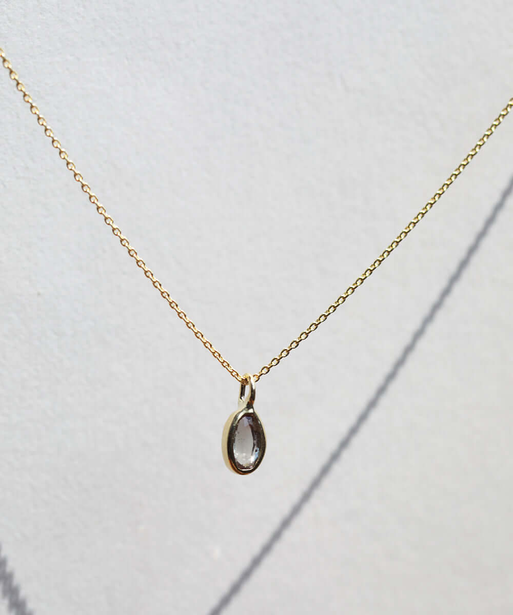 sunstone gem gold necklace NYC fine jewelry brooklyn NY New York jeweler sustainable ethical greenpoint engagement