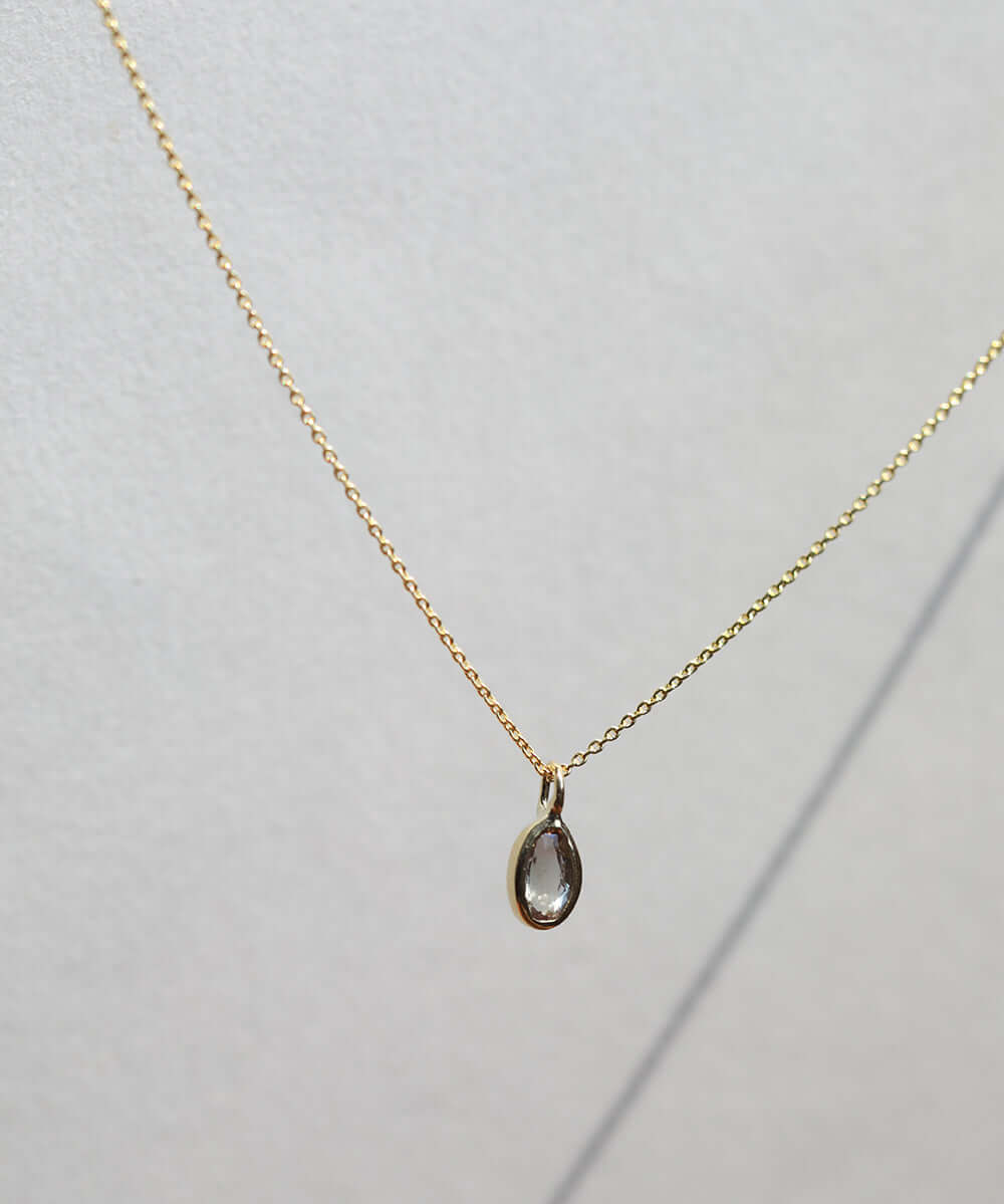 sunstone gem gold necklace NYC fine jewelry brooklyn NY New York jeweler sustainable ethical greenpoint engagement