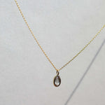 sunstone gem gold necklace NYC fine jewelry brooklyn NY New York jeweler sustainable ethical greenpoint engagement
