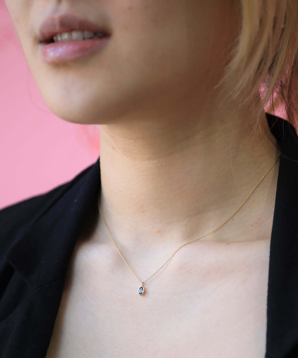 sunstone gem gold necklace NYC fine jewelry brooklyn NY New York jeweler sustainable ethical greenpoint engagement