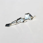 sculptural brooch or lapel pin for weddings, crafted in sterling silver by Macha Studio, Greenpoint, Brooklyn NYC