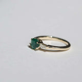 Round cut emerald engagement ring 14k yellow gold white baguette diamonds handcrafted macha studio brooklyn new york