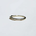 thin 14k yellow gold band with scattered tiny accent white diamonds handcrafted macha studio brooklyn new york