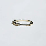 thin 14k yellow gold band with scattered tiny accent white diamonds handcrafted macha studio brooklyn new york