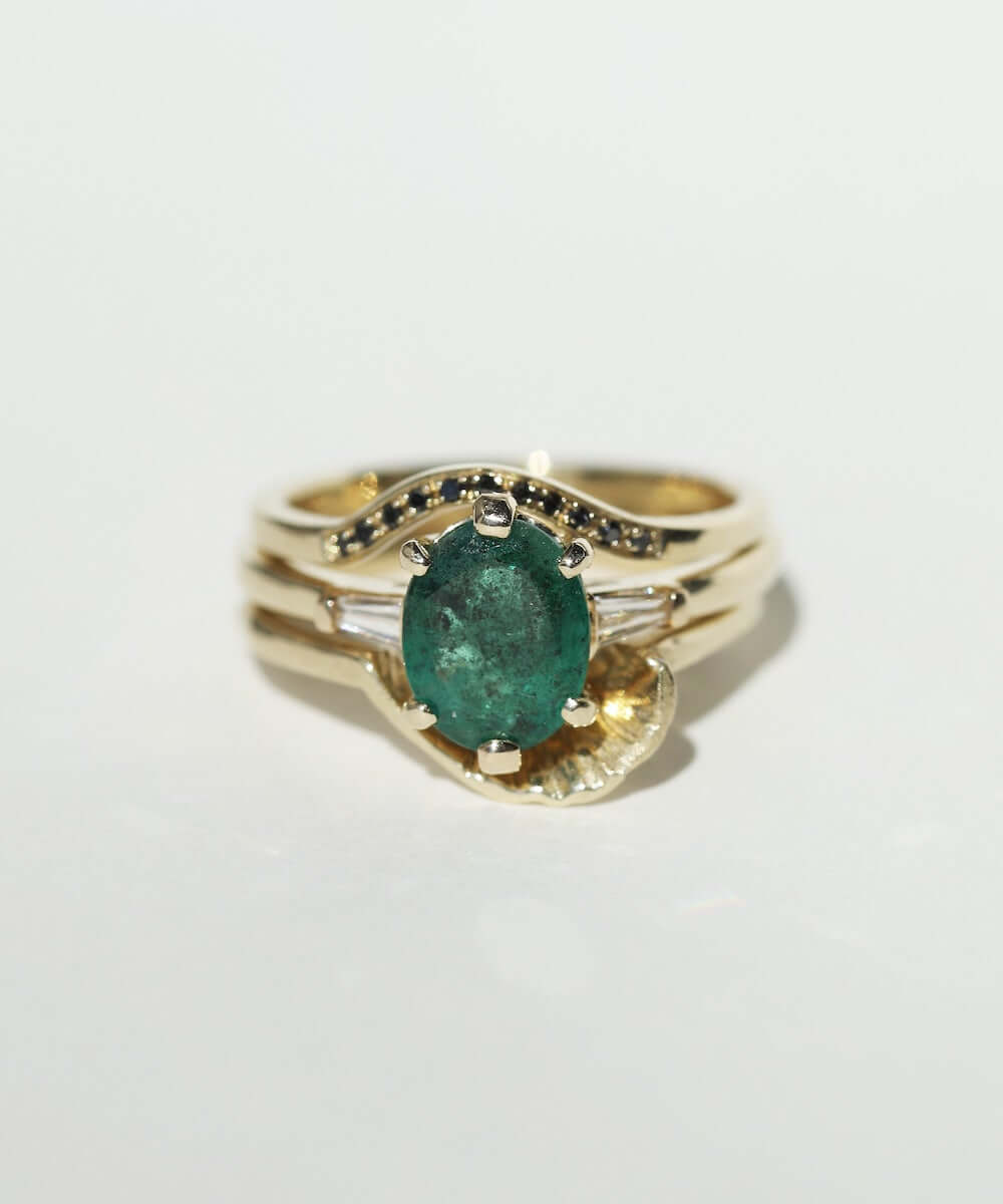 Oval Emerald engagement ring set in gold, by Macha Studio, Brooklyn NYC