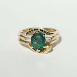 Oval Emerald engagement ring set in gold, by Macha Studio, Brooklyn NYC