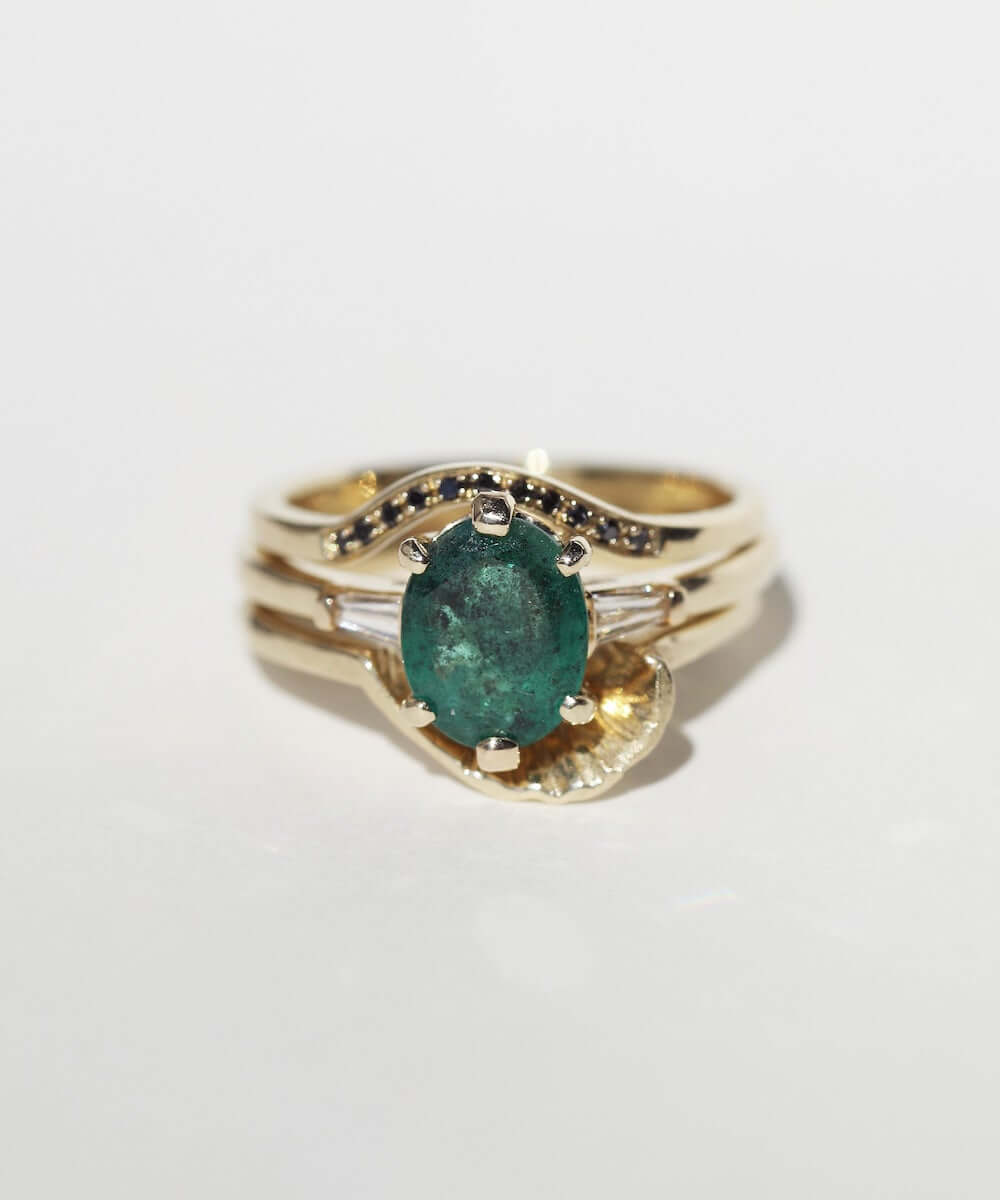 Oval Emerald engagement ring set in gold, by Macha Studio, Brooklyn NYC
