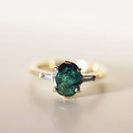 Oval Emerald engagement ring set in gold, by Macha Studio, Brooklyn NYC